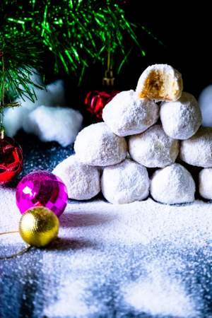 snowball cookies stacked for christmas
