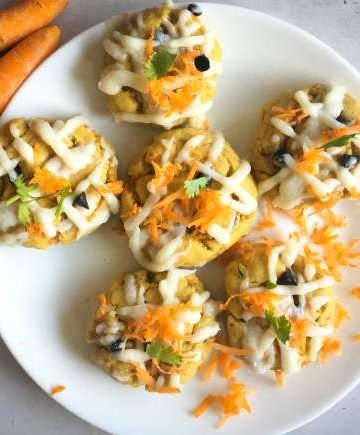 carrot cake chocolate chip cookies arranged on a white plate
