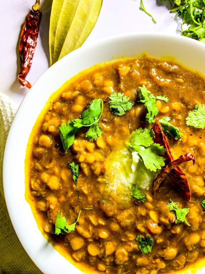 Traditional Brown Lentil Soup with garnishings