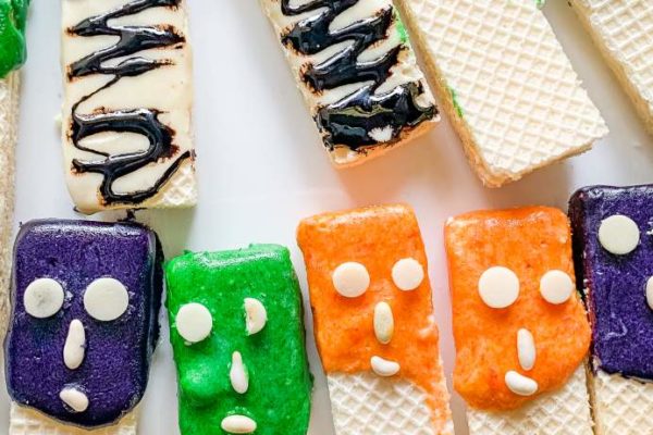 Halloween Wafer Cookies arranged on a white plate