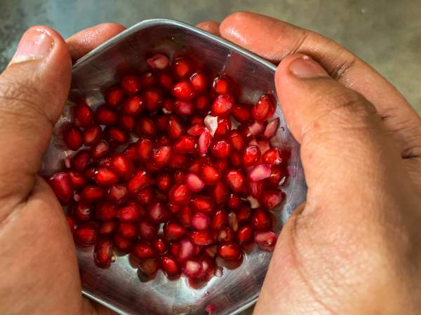 Pomegranate in hands