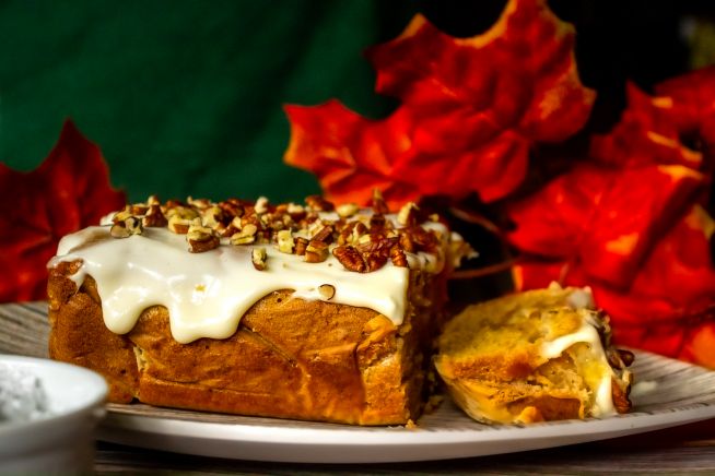 Pumpkin Spice Bread with Cream Cheese Frosting and Pecan Nut Topping
