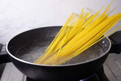 Cook pasta in a pan of boiling water
