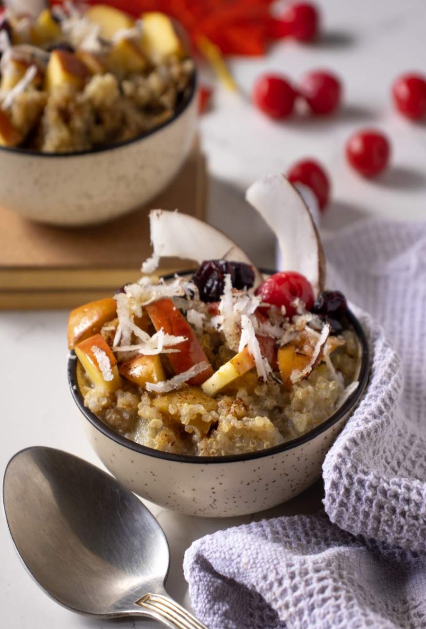 aA bowl full of Quinoa with apple and coconut
