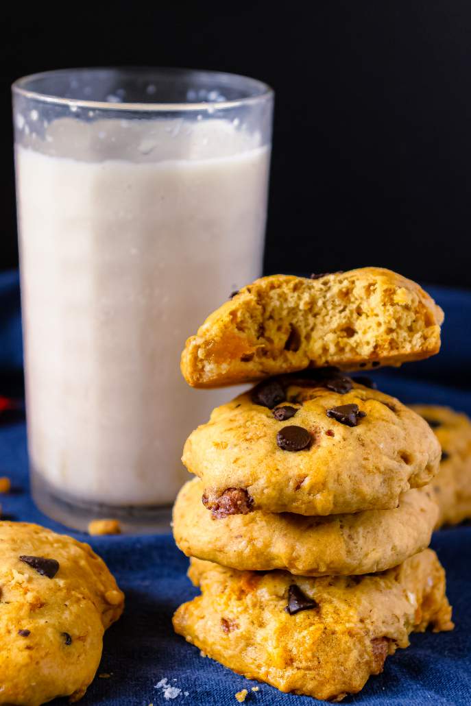 Soft Pumpkin Chocolate Chip Cookies stack with a glass of milk