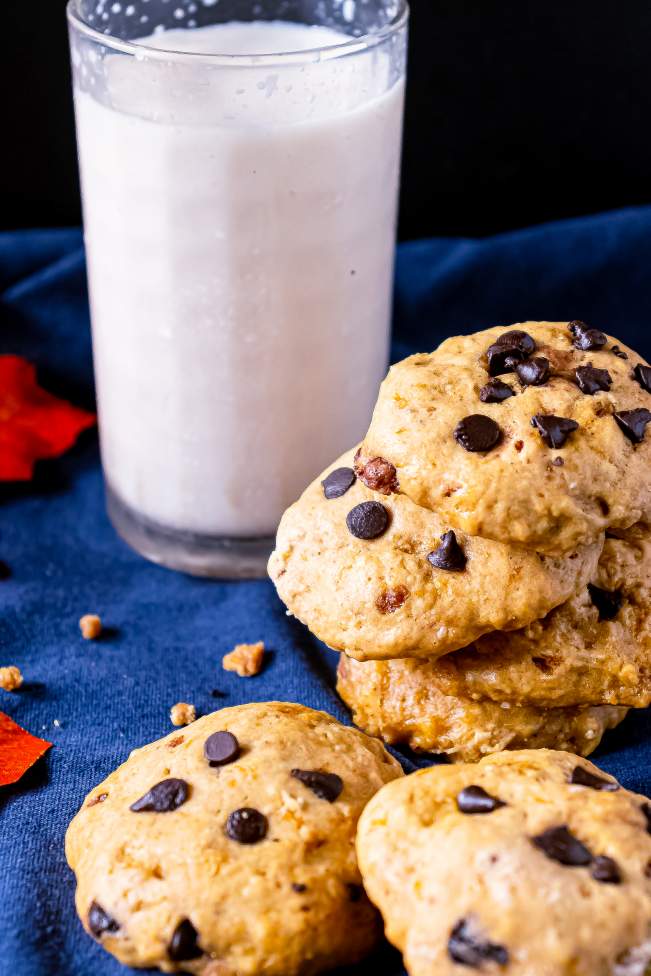 Soft Pumpkin Chocolate Chip Cookies with a glass of milk