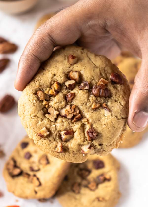holding a Brown Butter Pecan Cookies