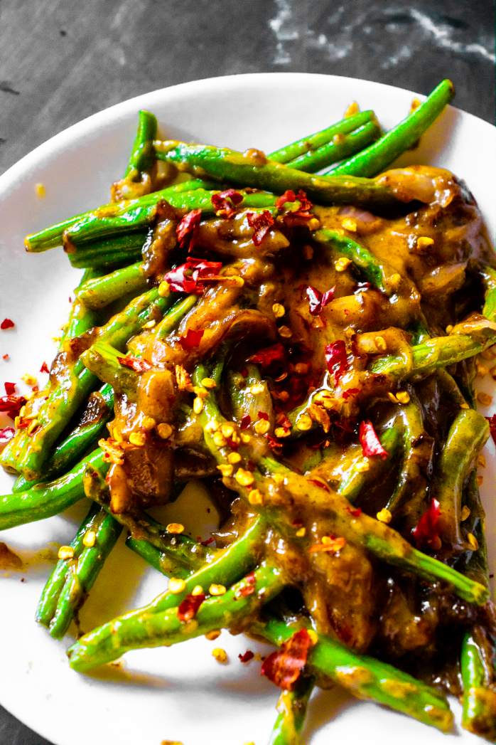 Maple Mustard Glazed Green Beans on a white plate