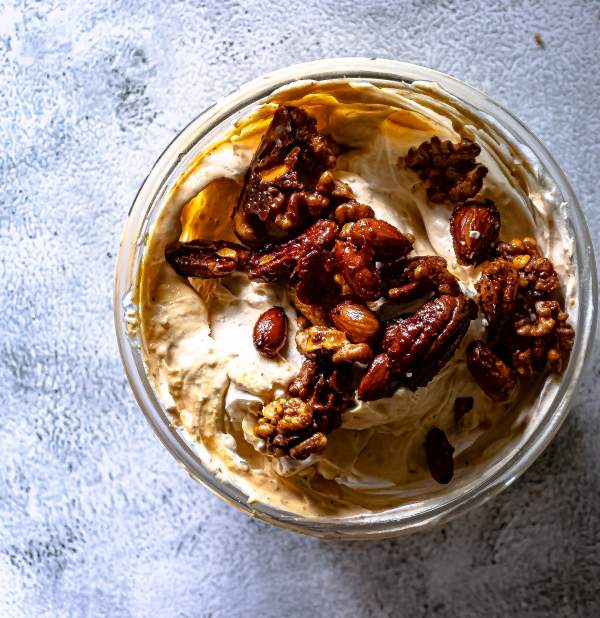 Spiced Nuts Sweet Potato Cheesecake Dip on a grey table top view 