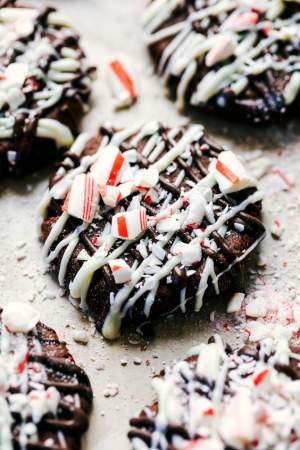 dark chocolate cookies with cream cheese frosting and rushed peppermint