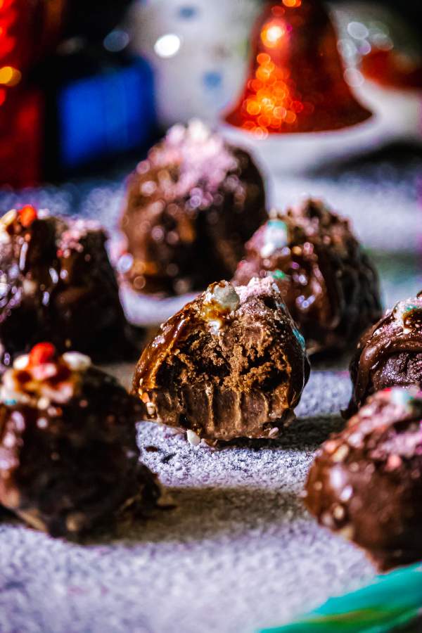 Dark Chocolate Peppermint Truffles with one of them eaten in half