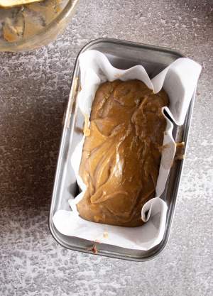 Moist Homemade Gingerbread Loaf placed in a loaf pan