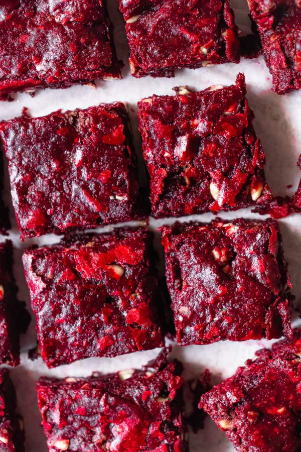 Red Velvet Brownies with White Chocolate Chips cut in squares