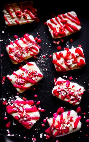 White Chocolate Covered Graham Crackers with Peppermint arranged in a baking tray