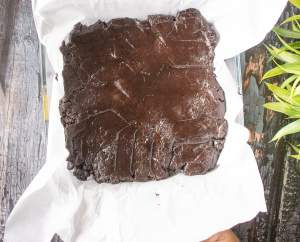 Brownie kept in a baking dish about to go in the oven