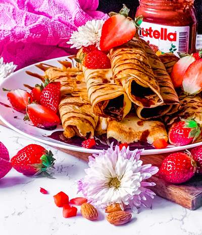 Nutella Crepes with Fresh Strawberries with nutella jar