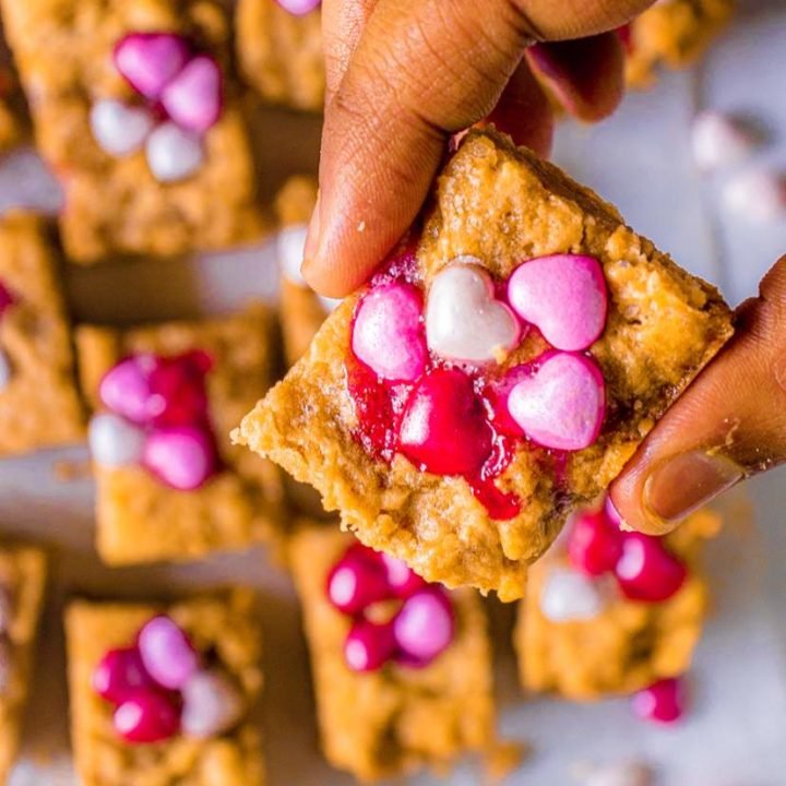holding one sugar cookie bar with hand