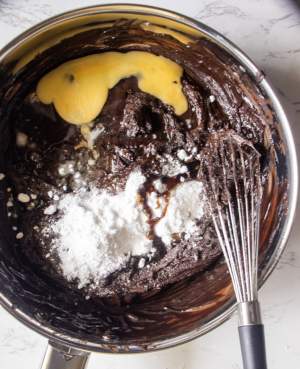 SUGAR EGG AND WIRED WHISK IN A PAN