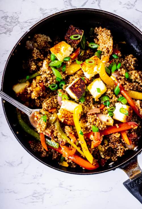 Healthy Quinoa Fried "Rice" with Crispy Tofu in a skillet