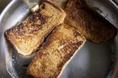 toasting bread with butter