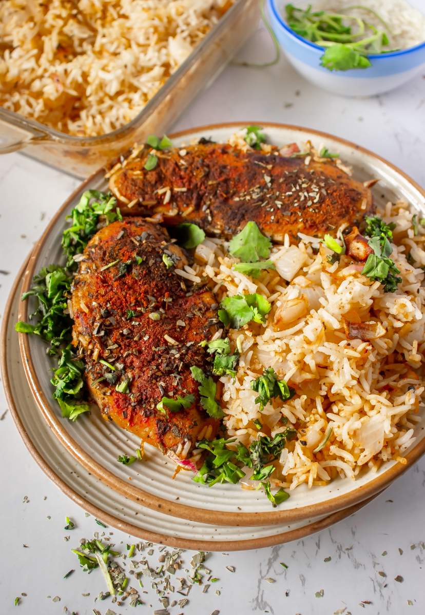 Oven Baked Chicken and Rice with chopped cilantro