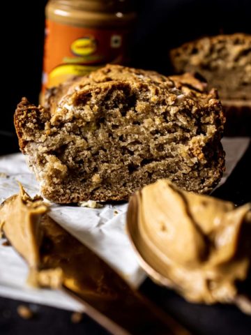 Peanut Butter Banana Bread with Peanut butter on a spoon