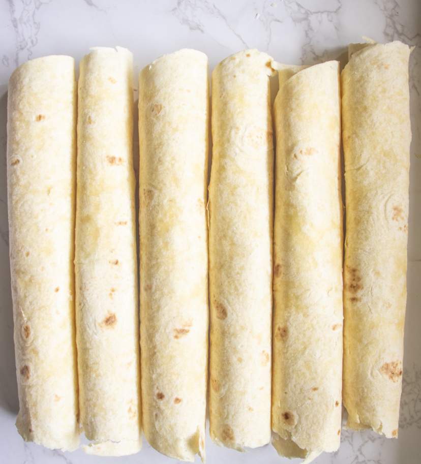 taquitos rolled and kept on a white surface