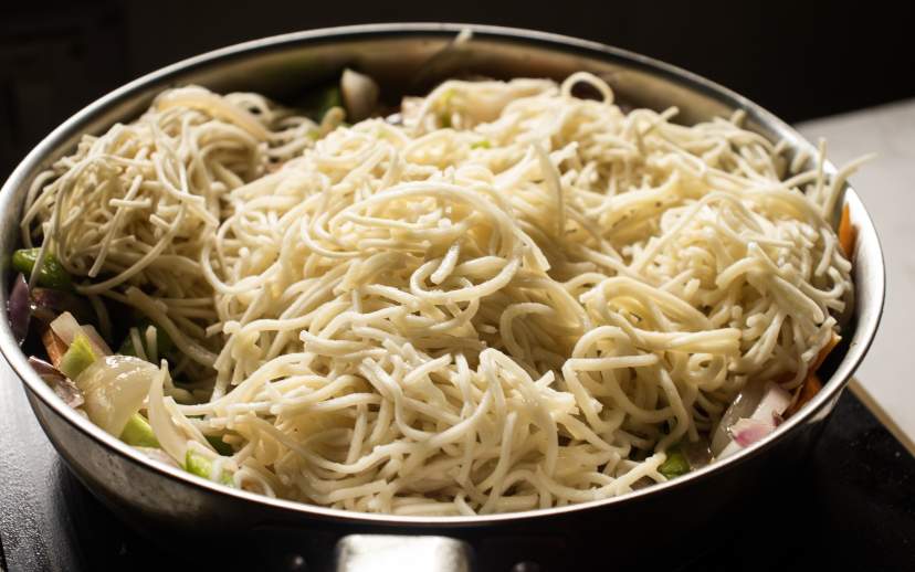 Noodles added to the skillet