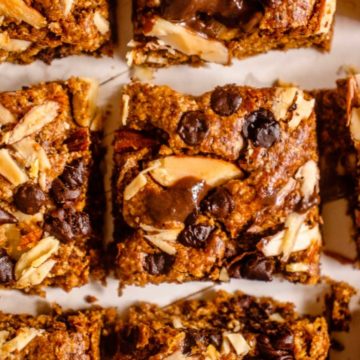 close up of almond flour oatmeal bar with almonds on top