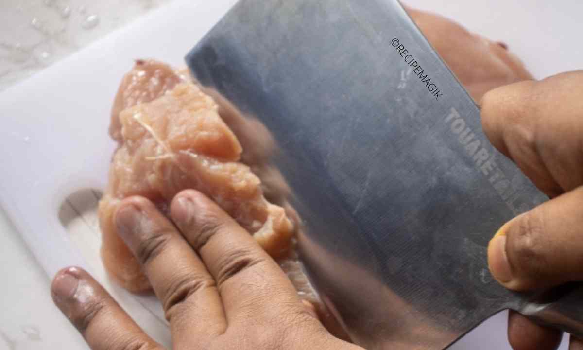 cutting chicken into thin fillets