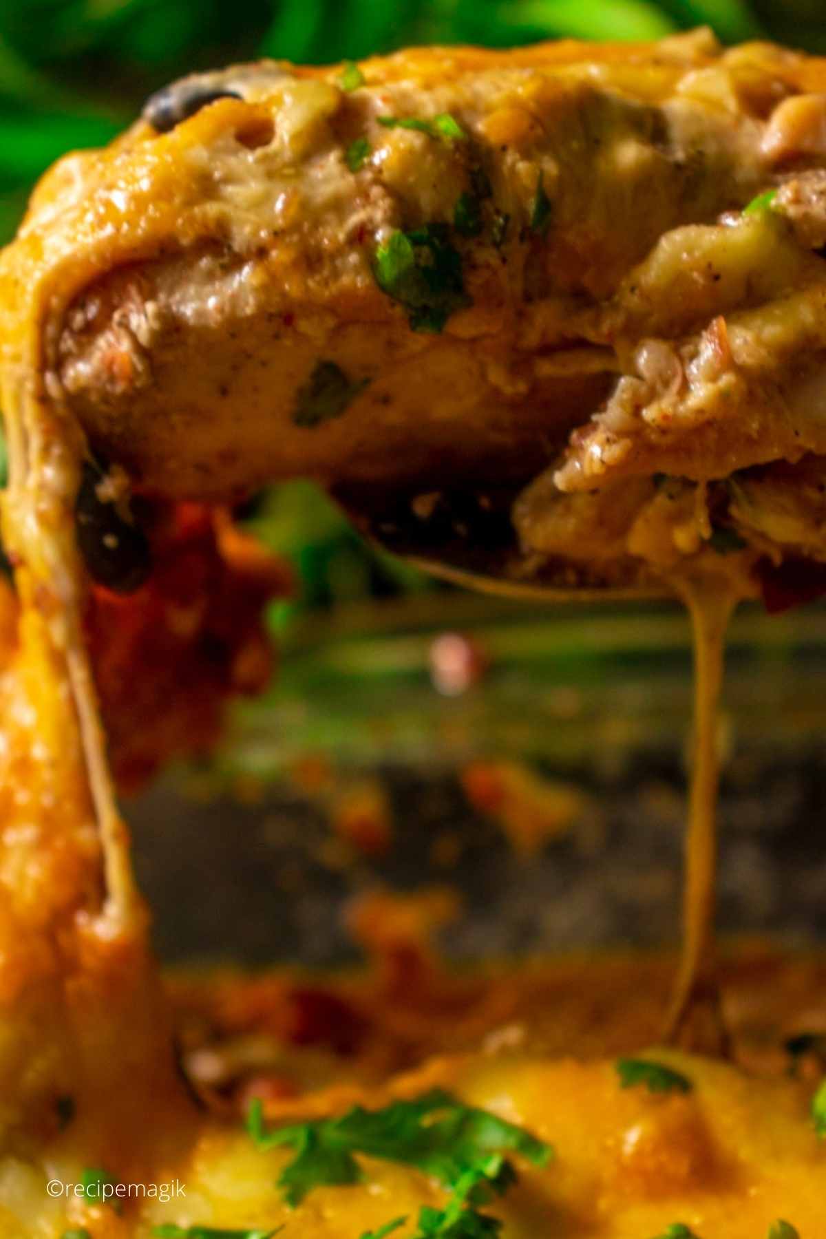 cheese pull shown while serving southwestern baked chicken