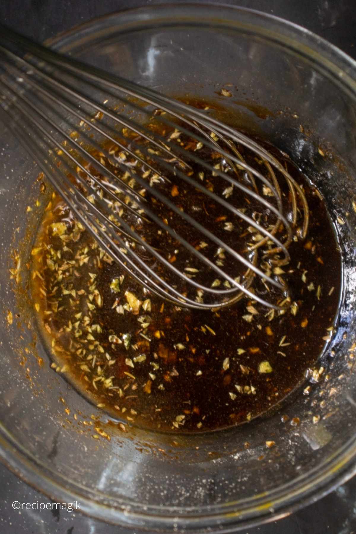 Balsamic marinade for chicken in a bowl 