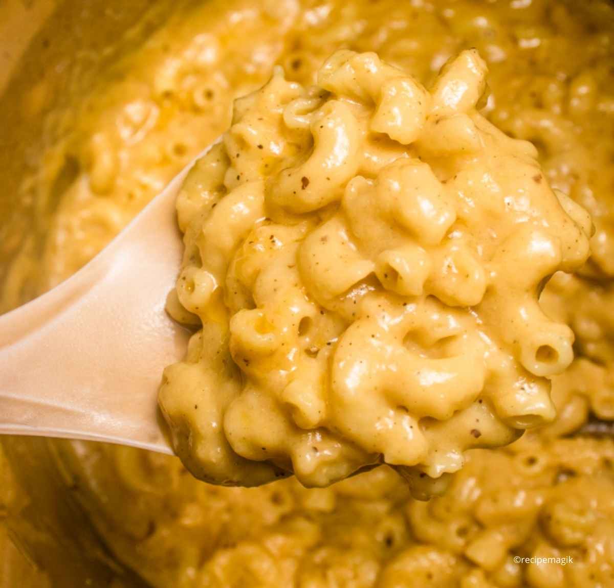 Instant Pot Mac and Cheese in spatula closeup