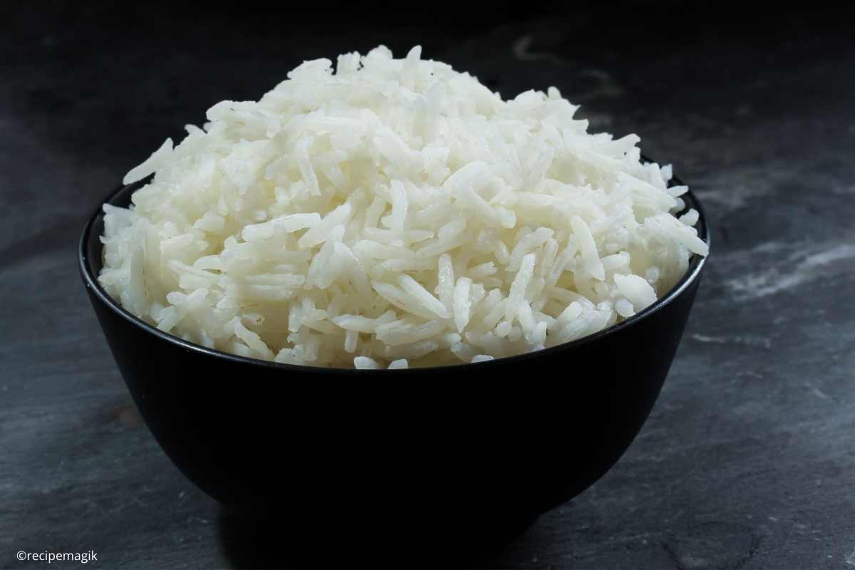 cooked rice in a black bowl