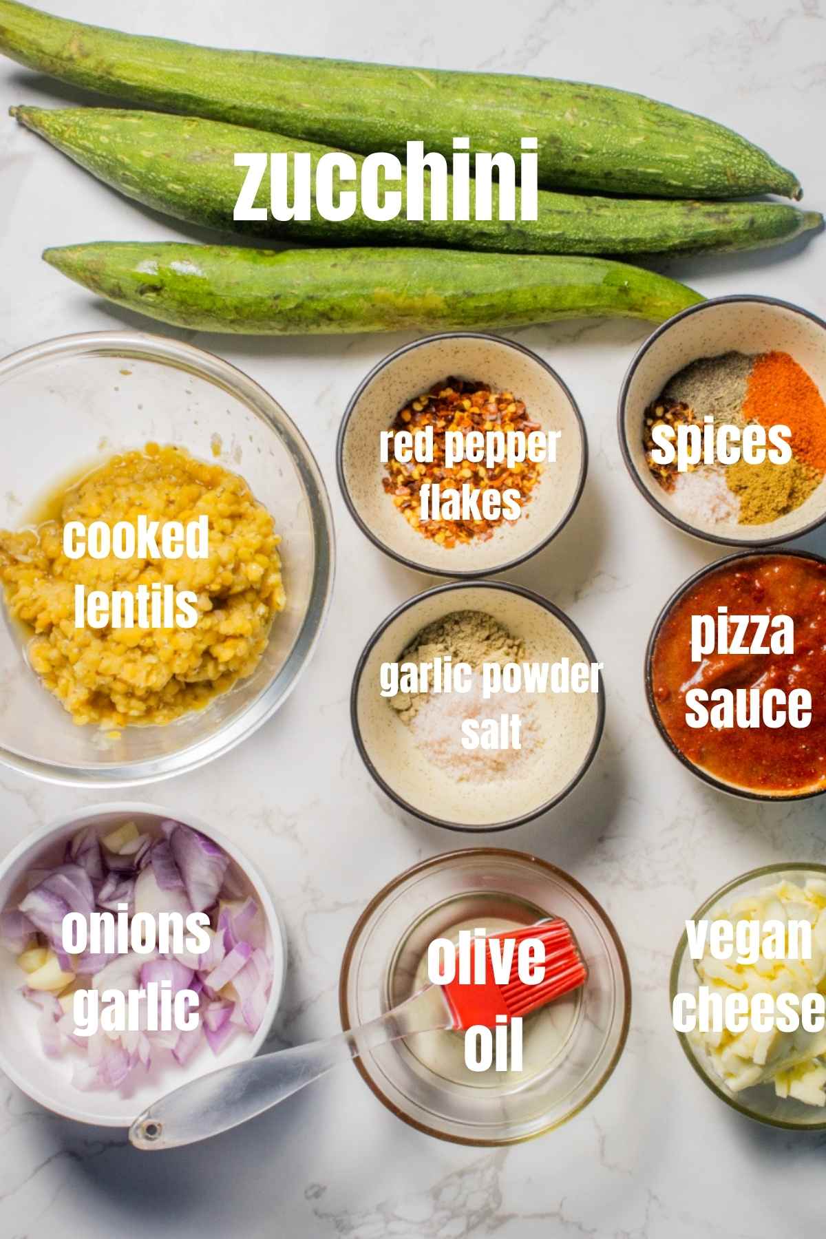 ingredients for lentil stuffed zucchini boats on table
