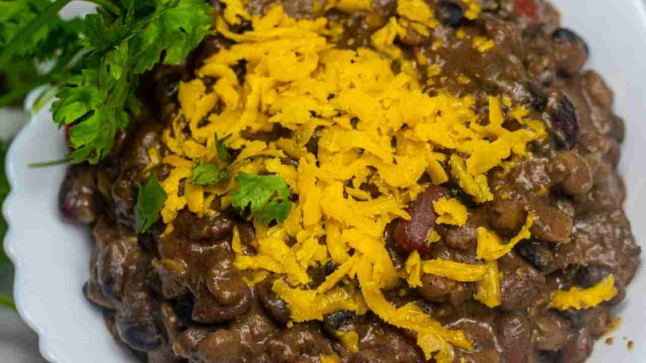 Slow Cooker Lentil Chili with cheese on top