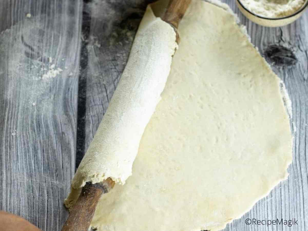 pie crust wrapped on a rolling pin