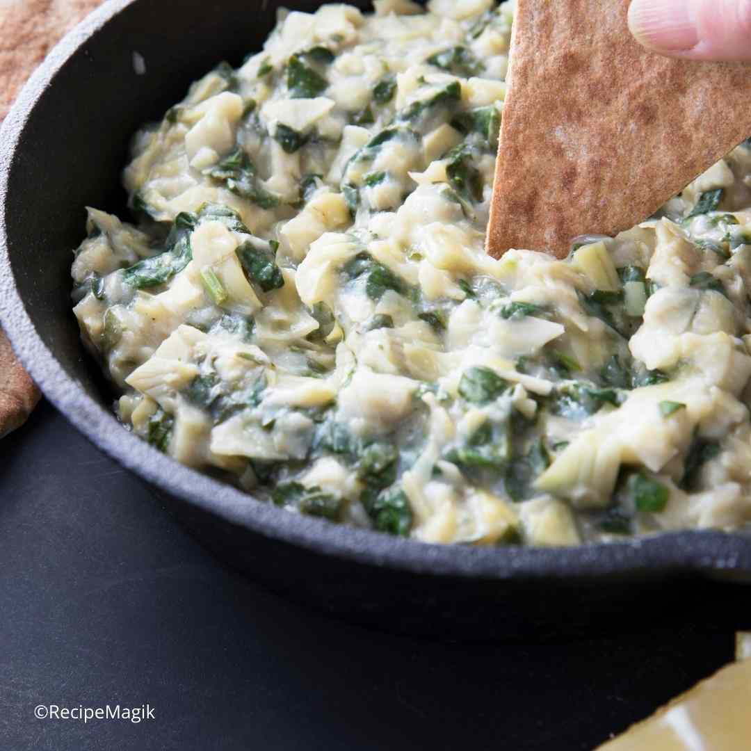 vegan spinach and artichoke dip with pita chips