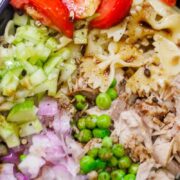 tuna pasta salad with green peas and red onions