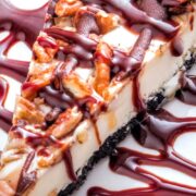 turtle cheesecake with caramel and chocolate sauce