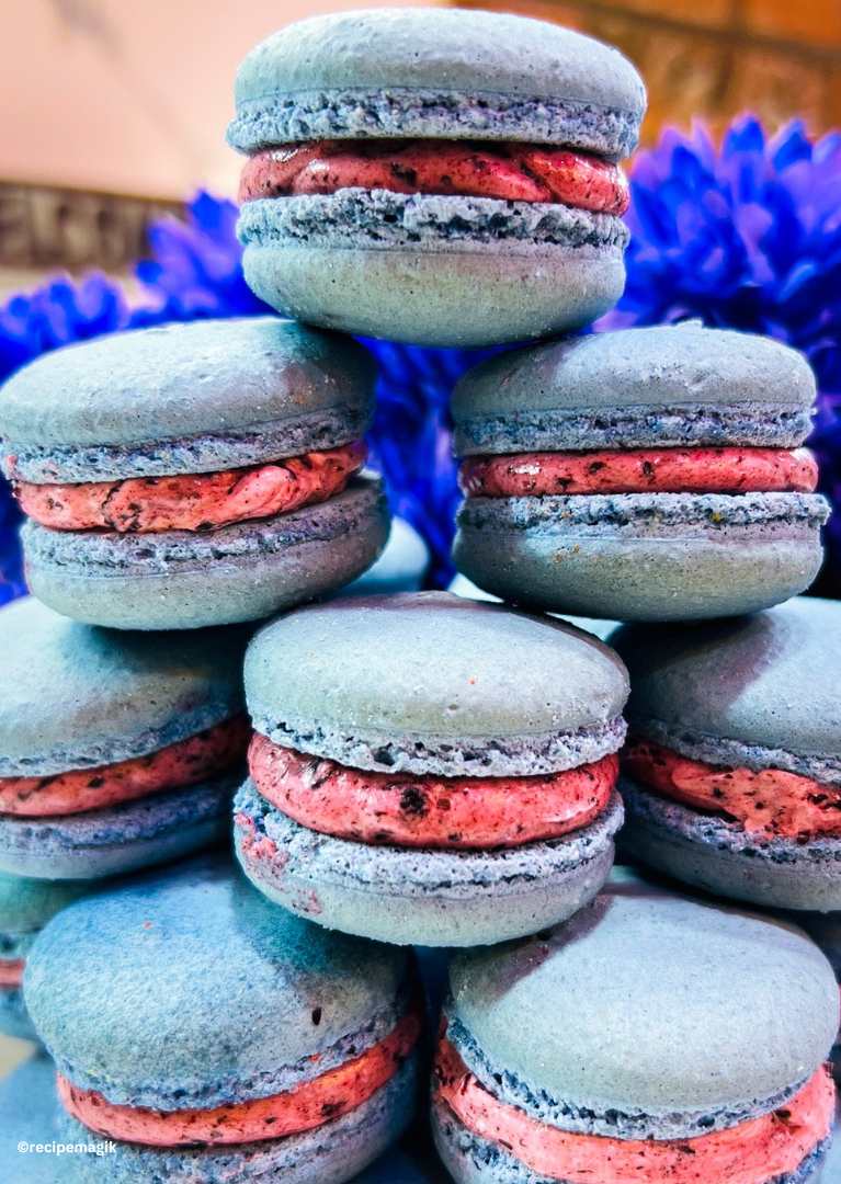stack of blueberry macarons with blueberry buttercream frosting