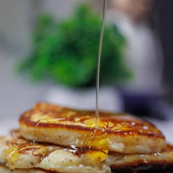 protein pancakes being drizzled with maple