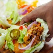 serving lettuce cheeseburger wrap