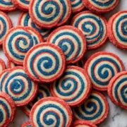 patriotic pinwheel cookies laid out on table