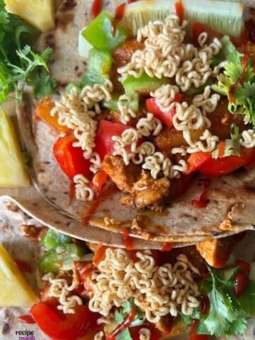 hawaiian chicken tacos with crunchy asian noodles on top